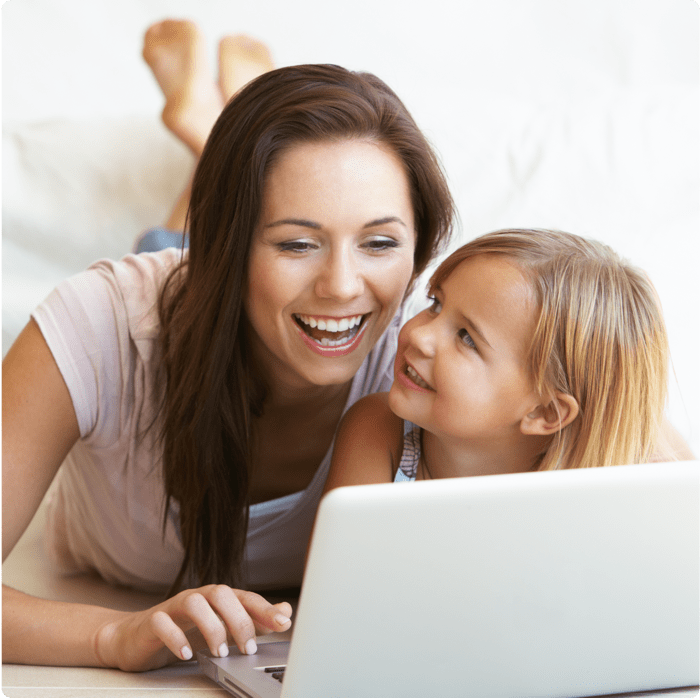Mother and daughter browsing the internet